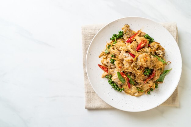 stir fried holy basil with fish and herb