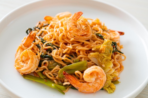 Stir-fried instant noodles sukiyaki with shrimps - Asian food style