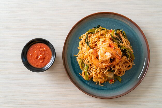 Stir-fried instant noodles sukiyaki with shrimps - Asian food style