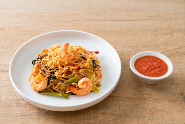 Stir-fried instant noodles sukiyaki with shrimps - Asian food style