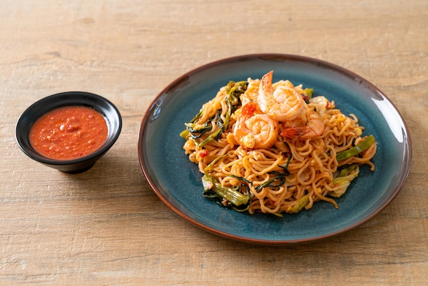 Stir-fried instant noodles sukiyaki with shrimps - Asian food style