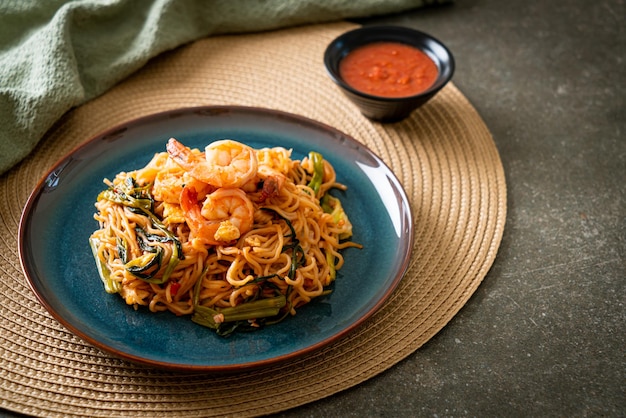 Stir-fried instant noodles sukiyaki with shrimps - asian food\
style