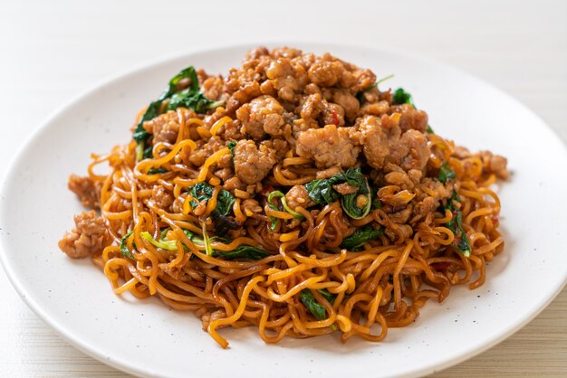 stir-fried instant noodles with Thai basil and minced pork - Asian food style