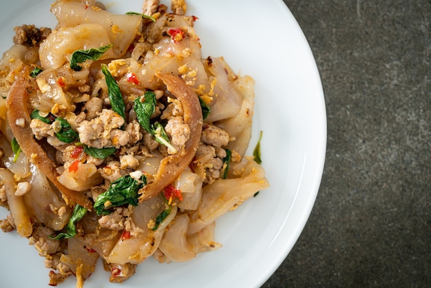 Stir-fried noodle with minced chicken and basil - Asian food style