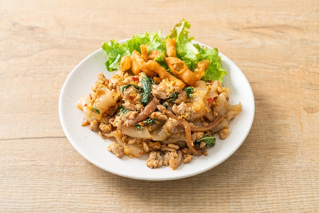 Stir-fried noodle with minced chicken and basil - Asian food style