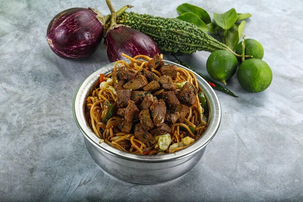 Stir fried noodles with beef and spices