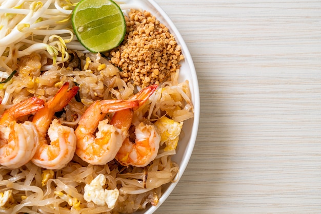 stir-fried noodles with shrimp and sprouts or Pad Thai - Asian food style