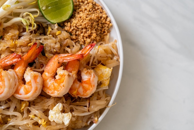 stir-fried noodles with shrimp and sprouts or Pad Thai - Asian food style
