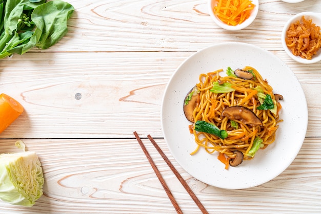 Stir-fried noodles with vegetables in asian style