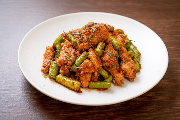 Stir fried pork and red curry paste with sting bean - Asian food style