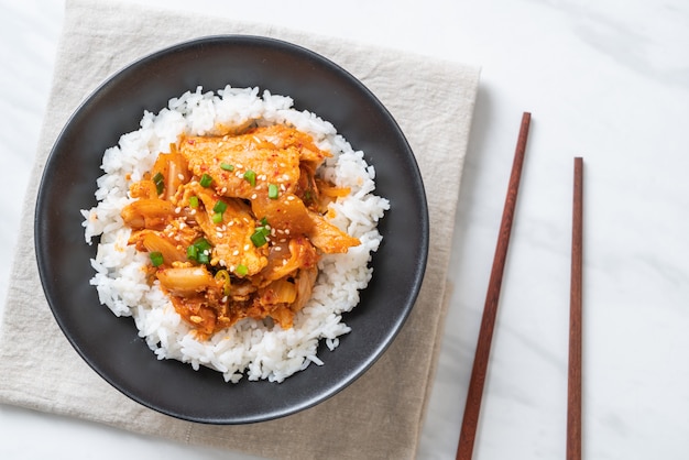 stir-fried pork with kimchi on topped rice