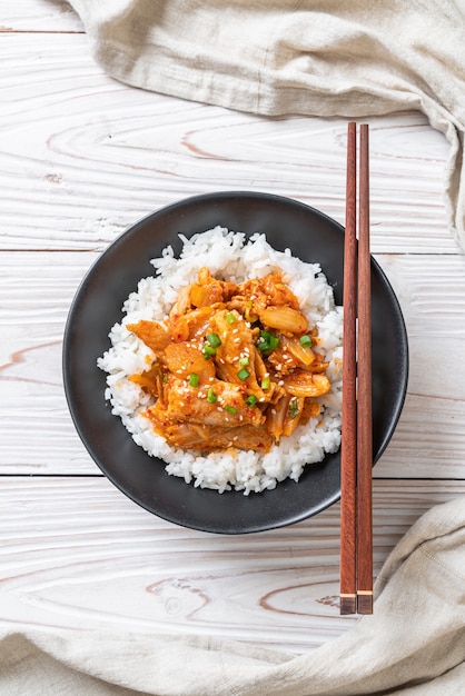 stir-fried pork with kimchi on topped rice