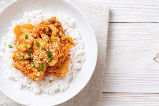 stir-fried pork with kimchi on topped rice 