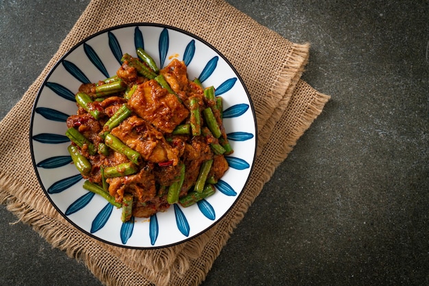 Stir fried pork with red curry paste - Thai food style