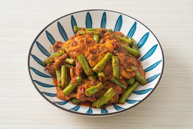 Stir fried pork with red curry paste - Thai food style