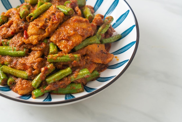 Stir fried pork with red curry paste - Thai food style