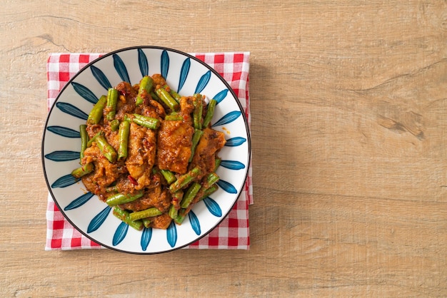 Stir fried pork with red curry paste - Thai food style