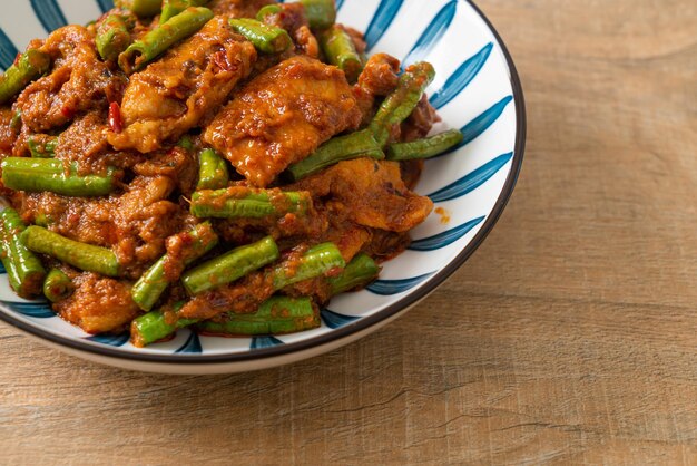 Stir fried pork with red curry paste - Thai food style