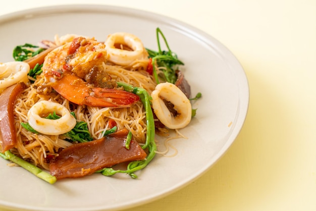 Stir-fried rice vermicelli and water mimosa with mix seafood - Asian food style