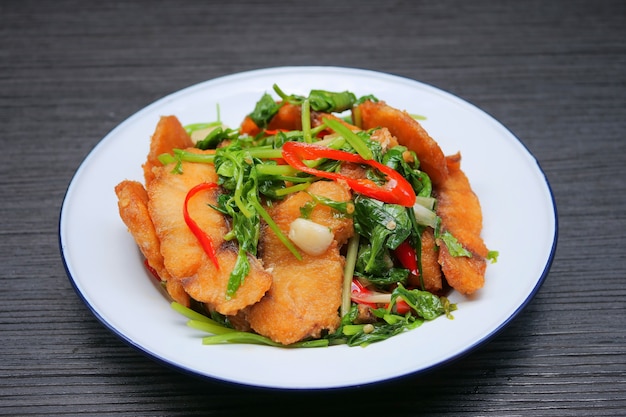 Stir fried sea bass with celery