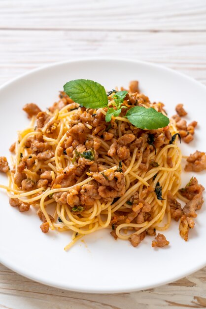 stir fried spaghetti with minced pork and basil