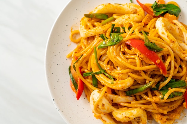 stir-fried spaghetti with salted egg and squid