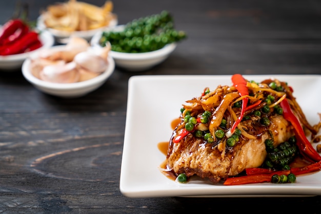 stir-fried spicy and herb with grouper fish fillet 