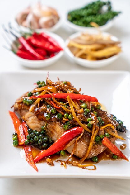 stir-fried spicy and herb with grouper fish fillet 