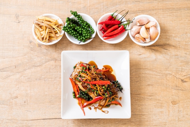 stir-fried spicy and herb with grouper fish fillet 