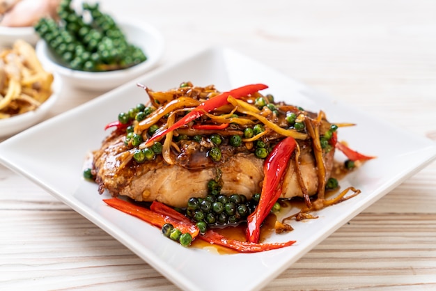 stir-fried spicy and herb with grouper fish fillet 