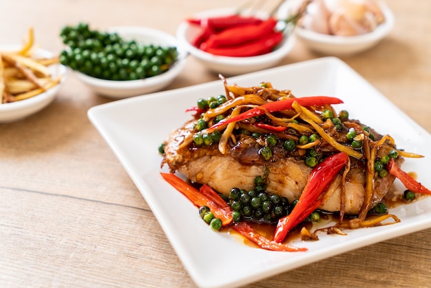 stir-fried spicy and herb with grouper fish fillet 