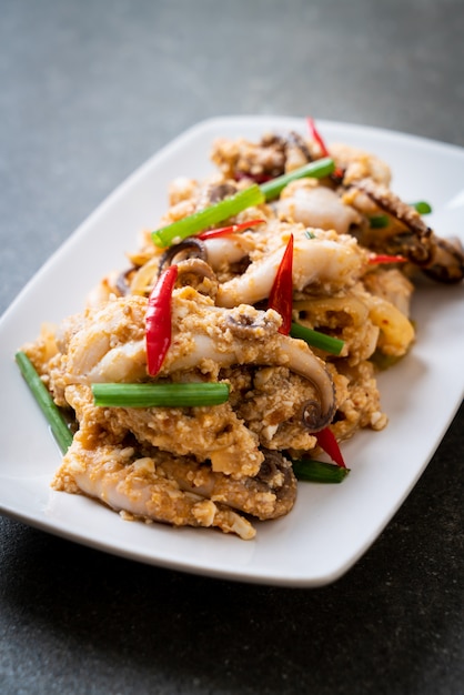Photo stir fried squid or octopus with salted eggs