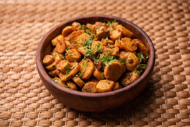 stir fried taro roots arbi ki sabji ghuiya masala curry sabzi or arvi dum masala garnished with coriander