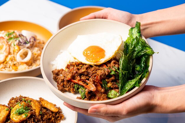 Stir fried Thai basil with wagyu beef and fried egg