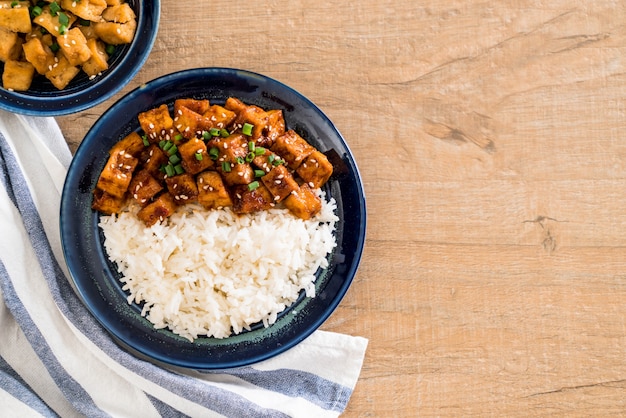 stir fried tofu with spicy sauce on rice