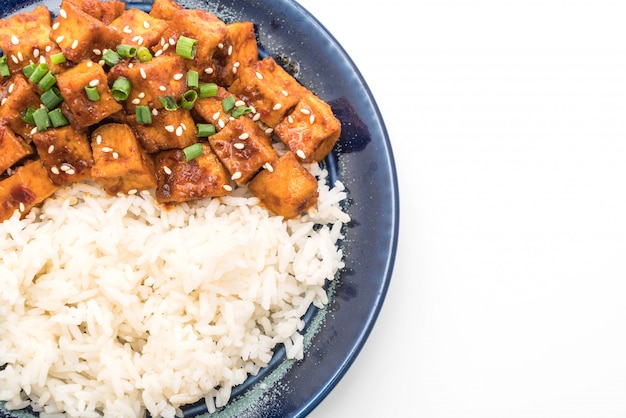 stir fried tofu with spicy sauce on rice