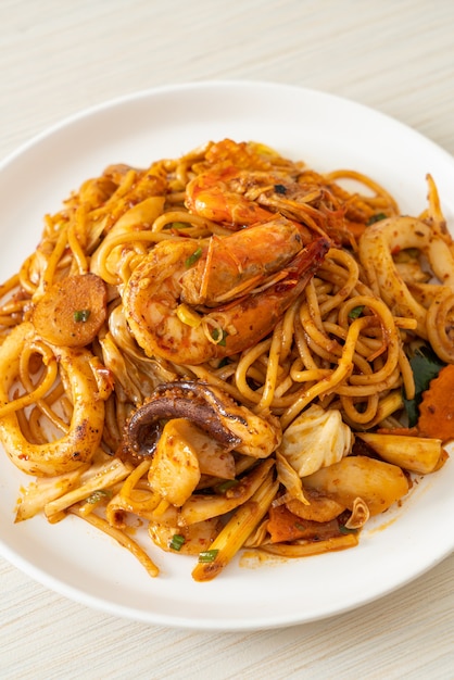 stir fried Tom Yum seafood dried spaghetti - Fusion food style