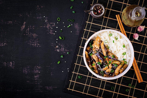 Stir fry with chicken, eggplant and boiled rice