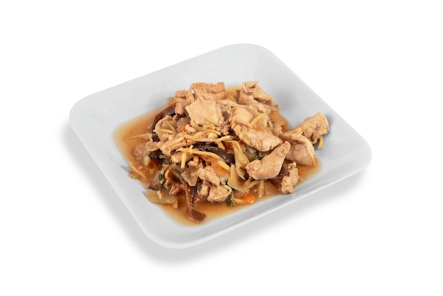 Stirfried chicken with ginger and mushroom on dish over white background