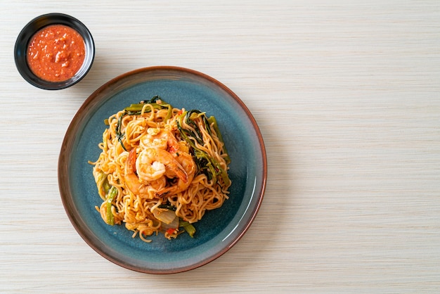 Stirfried instant noodles sukiyaki with shrimps