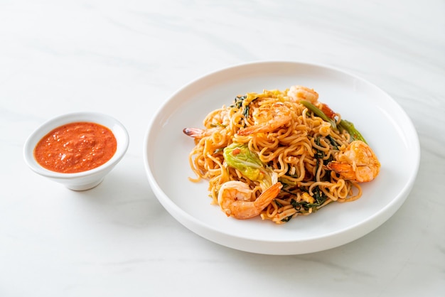 Stirfried instant noodles sukiyaki with shrimps