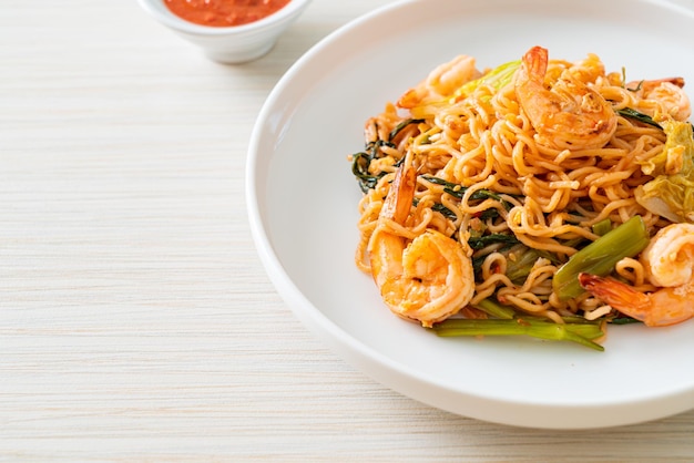 Stirfried instant noodles sukiyaki with shrimps
