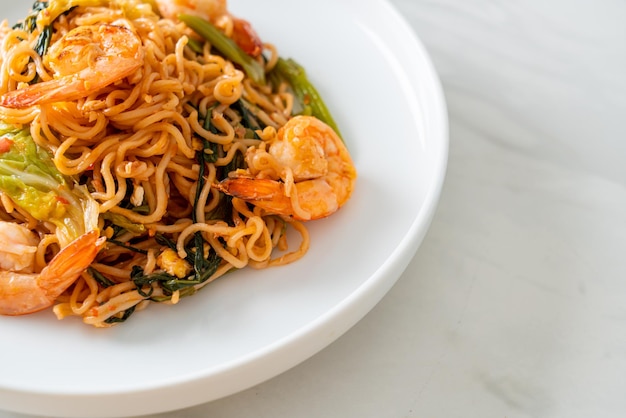 Stirfried instant noodles sukiyaki with shrimps