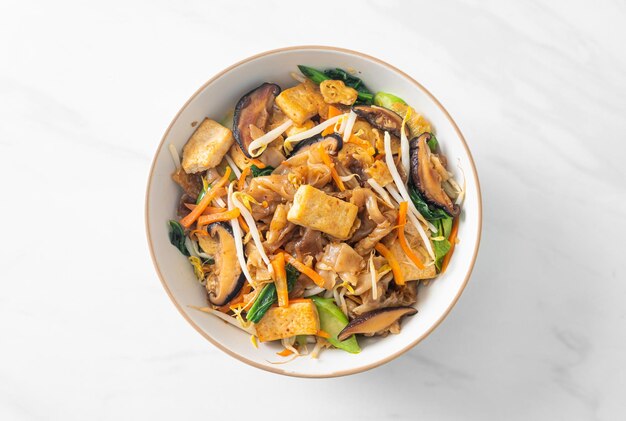 stirfried noodles with tofu and vegetables vegan and vegetarian food style