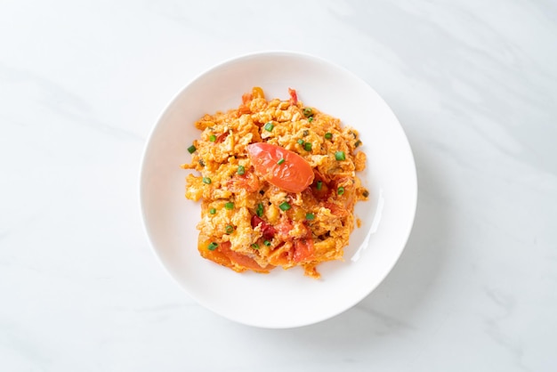 Stirfried tomatoes with egg or Scrambled eggs with tomatoes