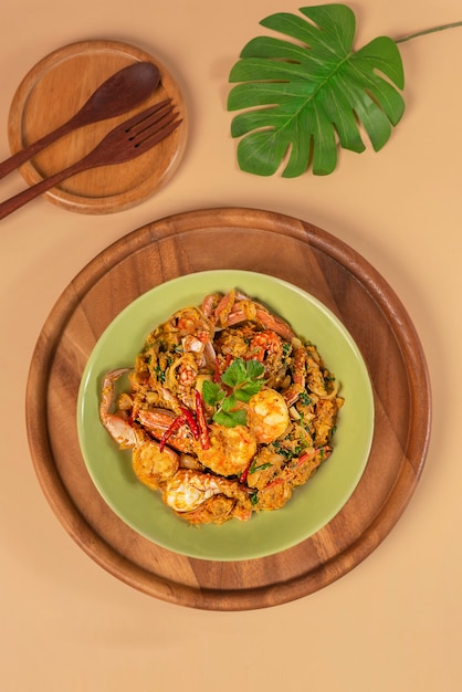 Stirred Fried seafood with Garlic, Pepper, Curry Powder and vegetable on dish