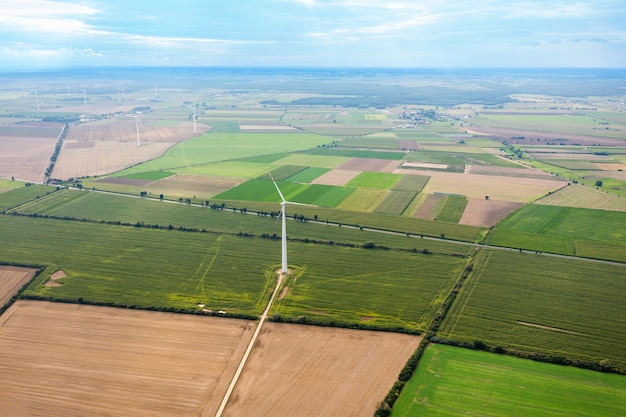 Stitched Panorbeautiful view from a great height on colorful fields, against the background of the summer blue sky, summer landscape with a drone, green fieldama