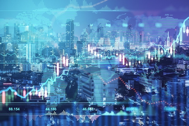 Stock market annual profit concept with financial indicators\
names of months and candlestick on digital screen at night city\
background