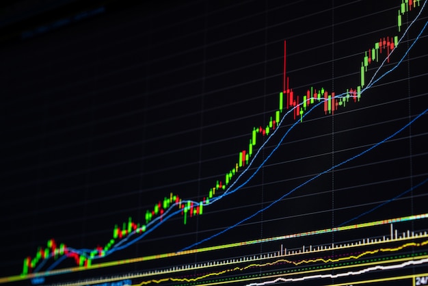 Stock market board background price graph chart.