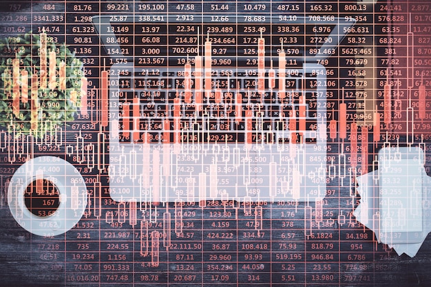 Foto grafico del mercato azionario e computer con vista dall'alto sullo sfondo del tavolo doppia esposizione concetto di analisi finanziaria